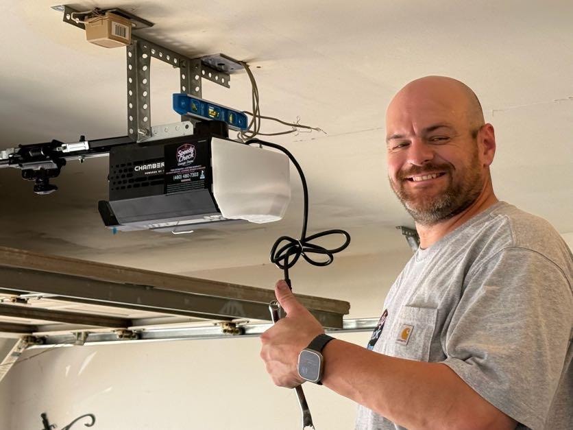 Speedy Check technician performing a garage door estimate