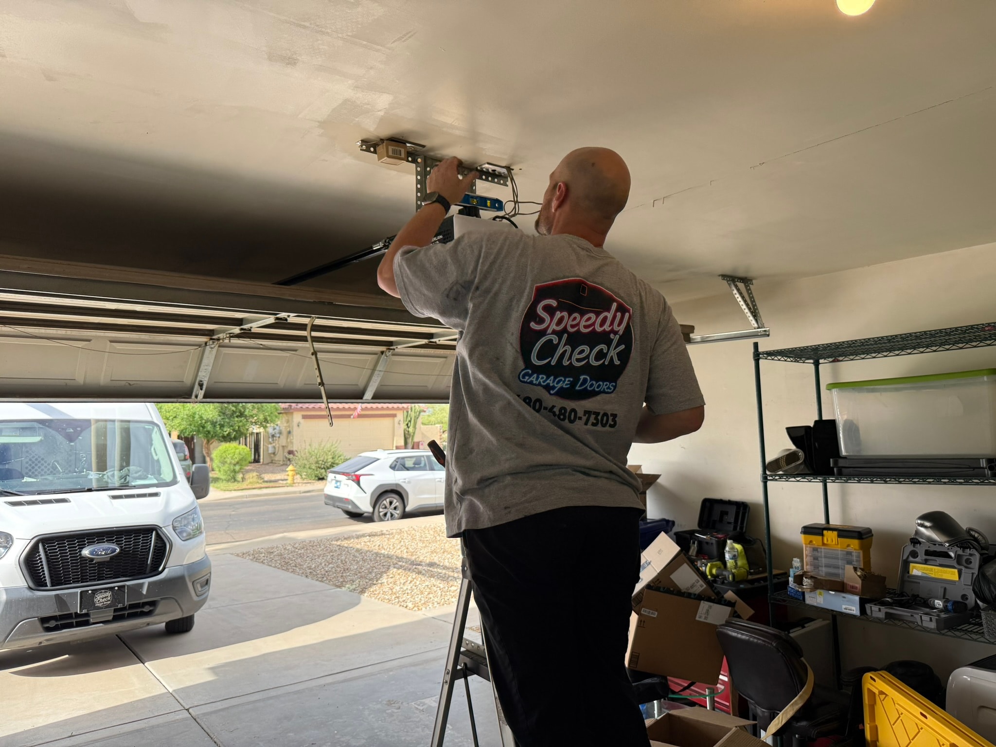 Garage door tune-up and maintenance by Speedy Check
